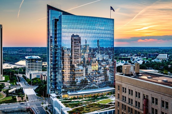 Picture of high-rise building in front of sunset