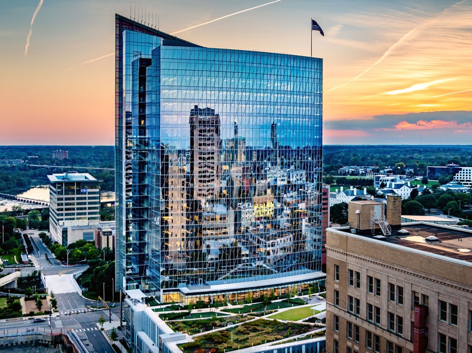 Picture of high-rise building in front of sunset