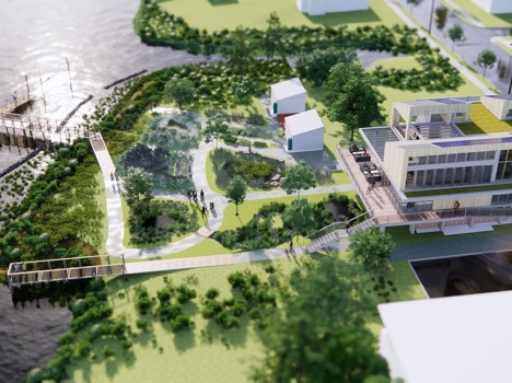 An aerial rendering of a modern building with many walkways and sidewalks around it that connect to a boardwalk.