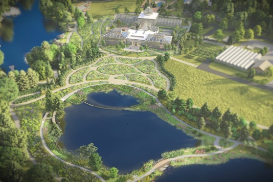 An aerial view rendering of a pond, flower garden and large glass building.