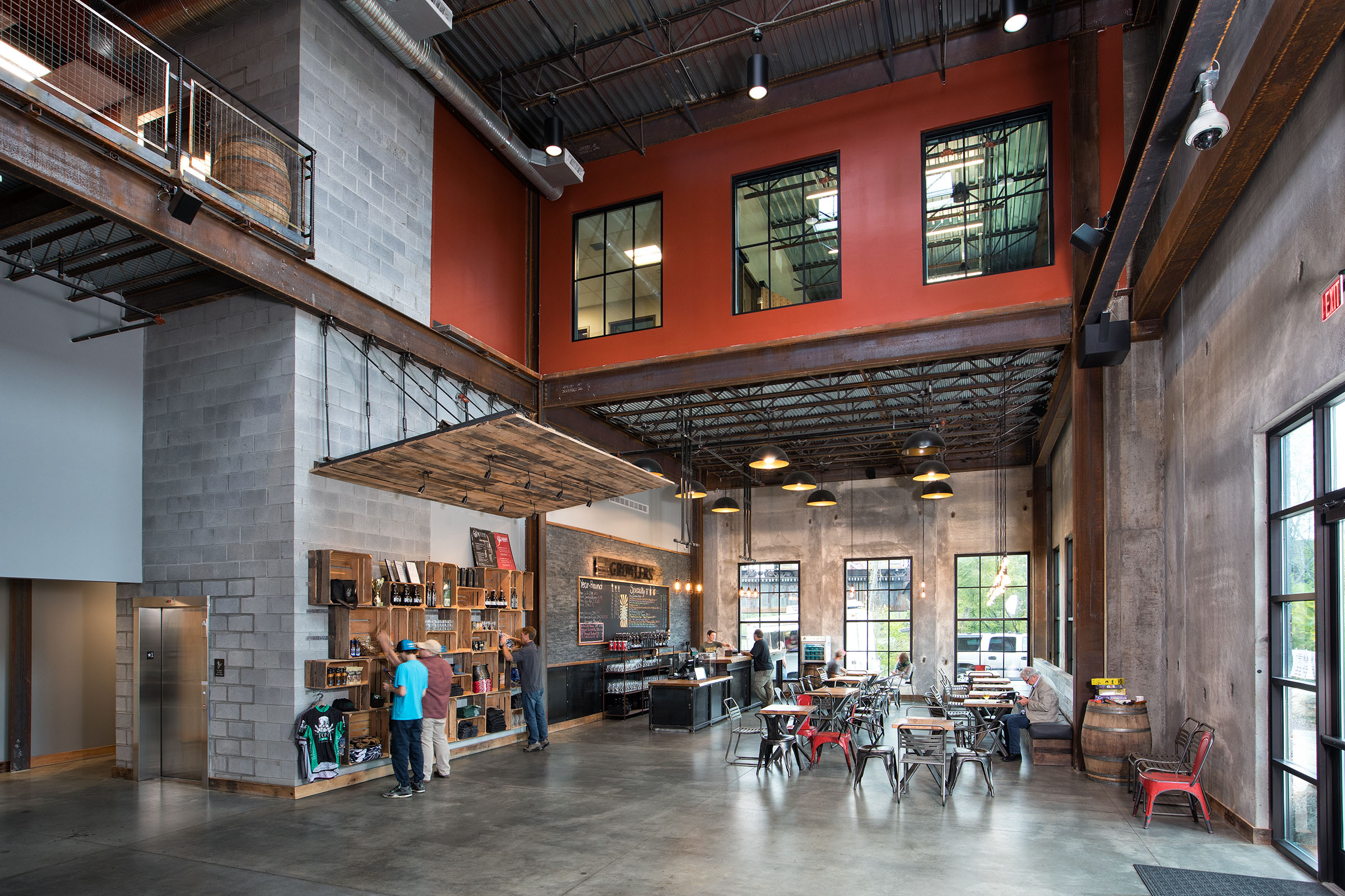 Interior of brewing facility wth tables and bar